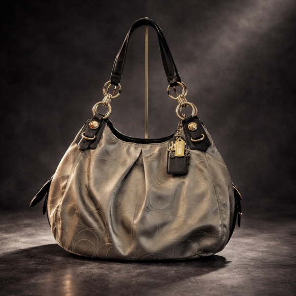 Coach Handbags - Coach Maggie Black and Gold Shoulder Bag